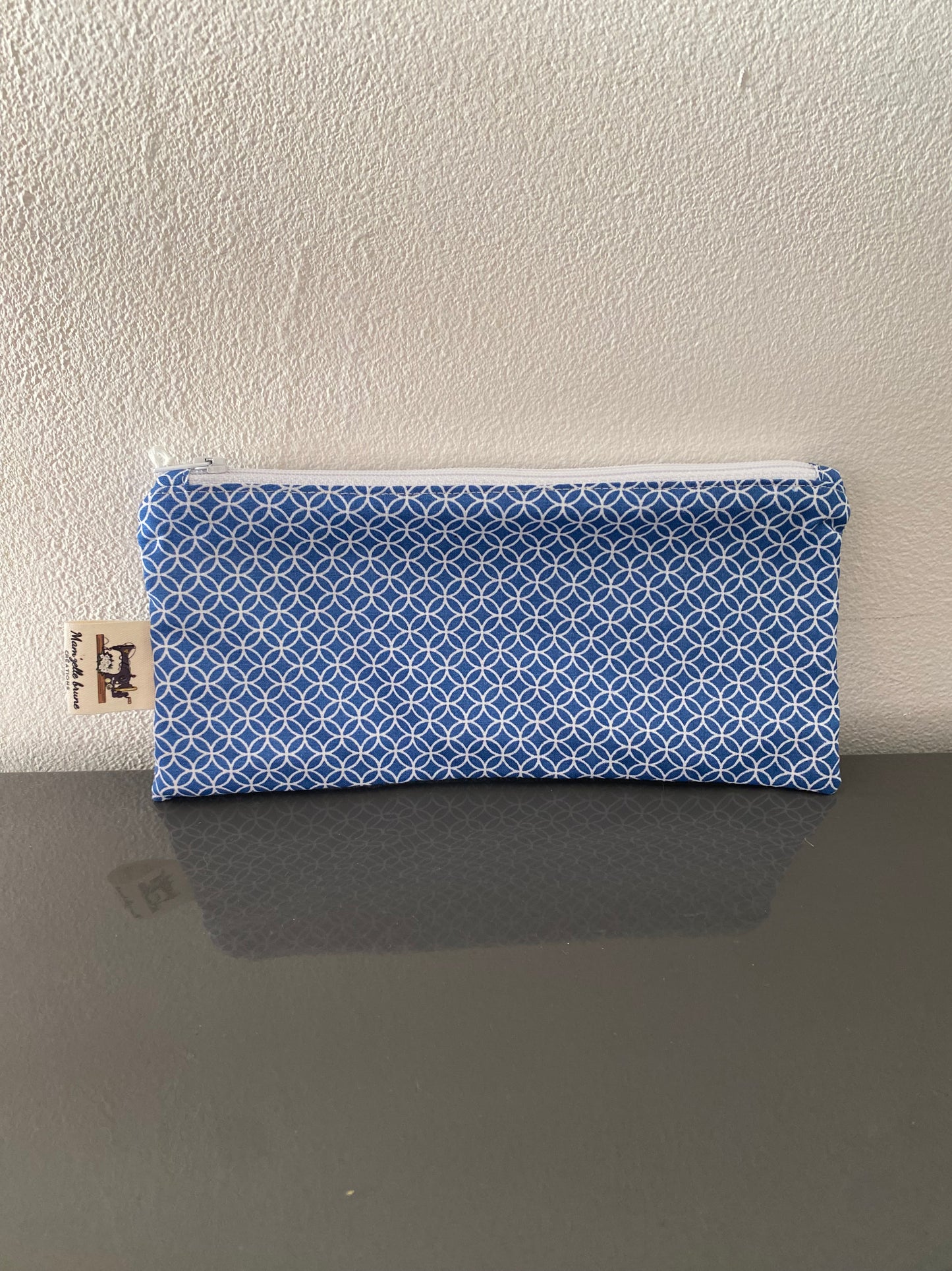 Trousse bleu géométrique